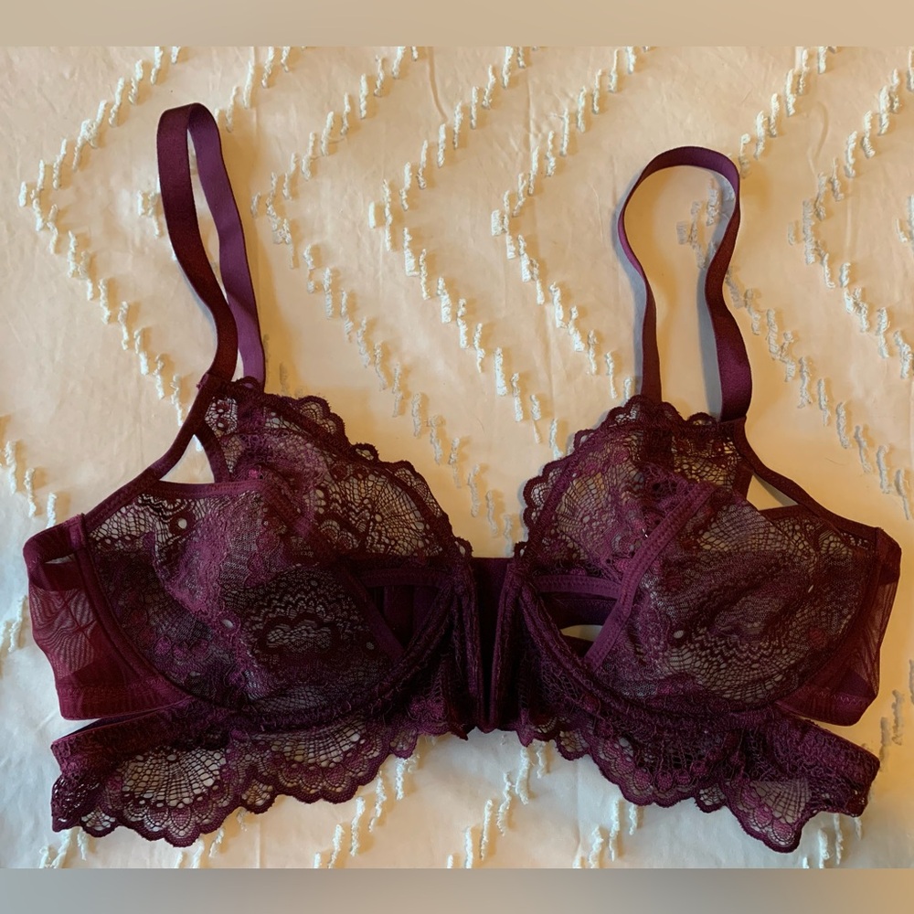 Sexy burgundy lace bra with cutouts.